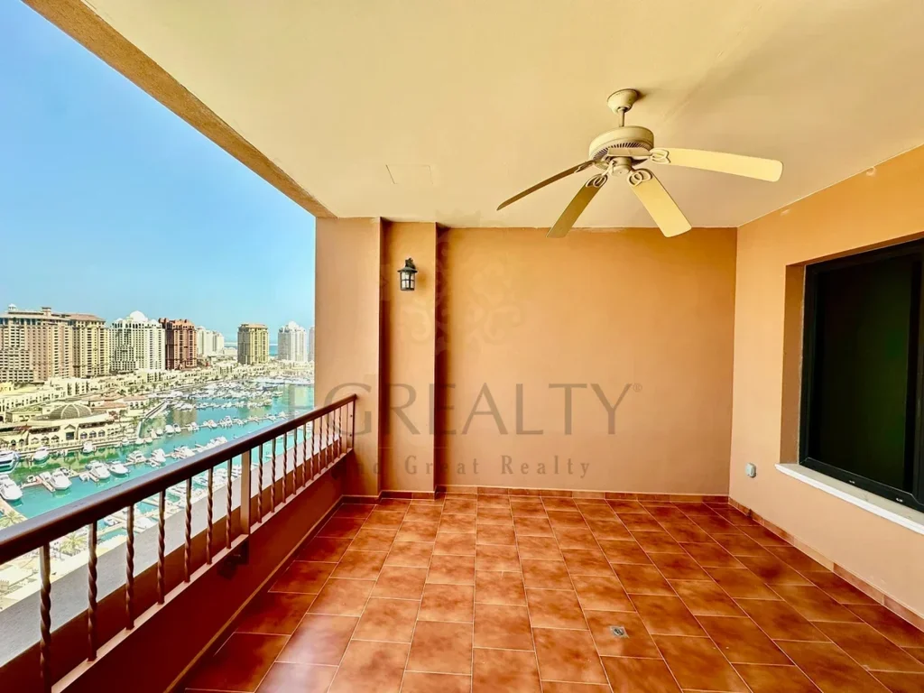 2 Bedrooms  Apartment  For Rent  in Doha -  The Pearl  Not Furnished