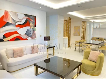 2 Bedrooms  Apartment  For Rent  in Doha -  The Pearl  Fully Furnished