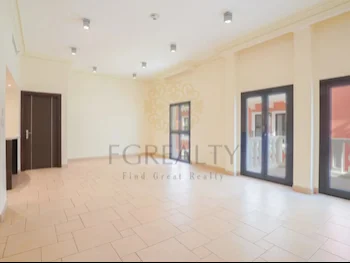 3 Bedrooms  Apartment  For Rent  in Doha -  The Pearl  Not Furnished