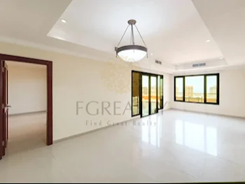 2 Bedrooms  Apartment  For Rent  in Doha -  The Pearl  Not Furnished