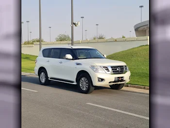 Nissan  Patrol  SE  2014  Automatic  385,000 Km  8 Cylinder  Four Wheel Drive (4WD)  SUV  White