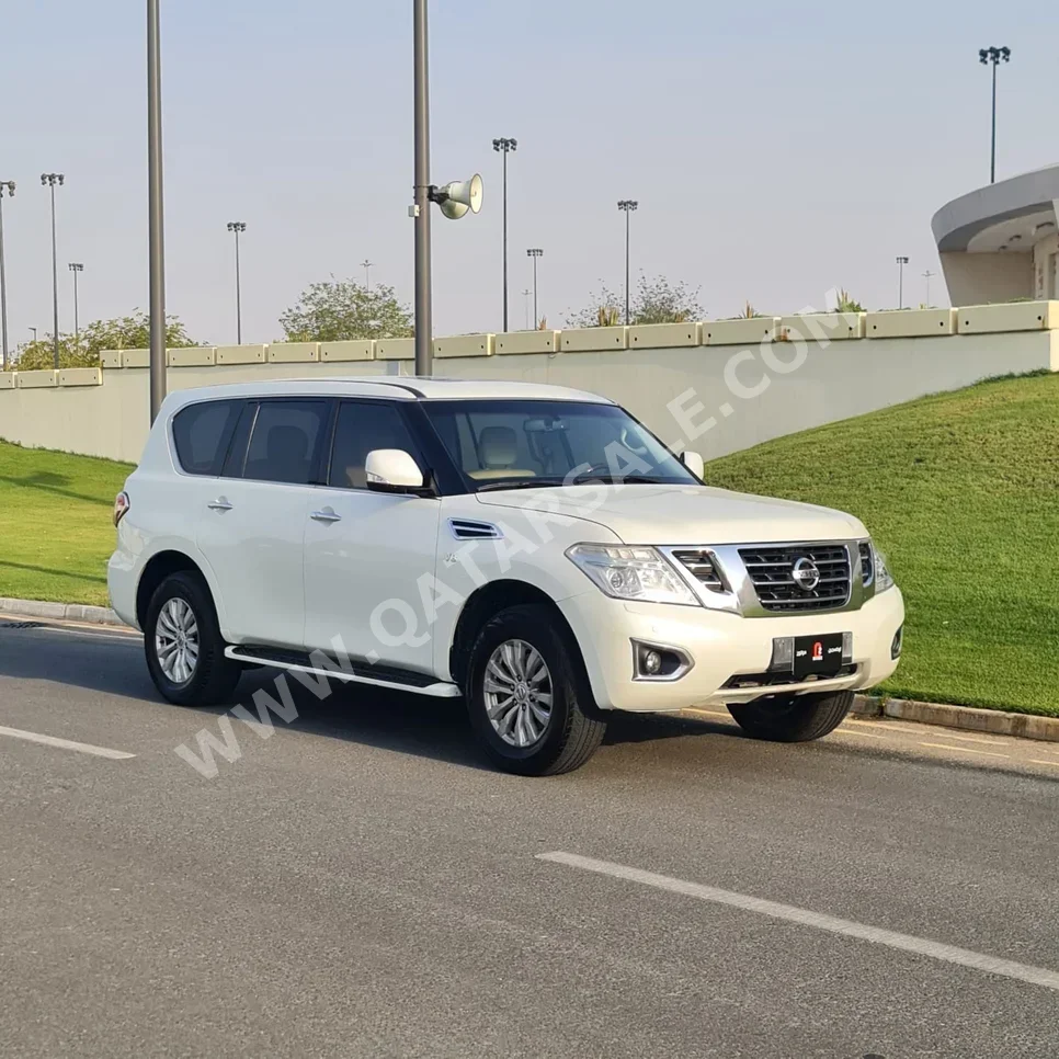 Nissan  Patrol  SE  2014  Automatic  385,000 Km  8 Cylinder  Four Wheel Drive (4WD)  SUV  White