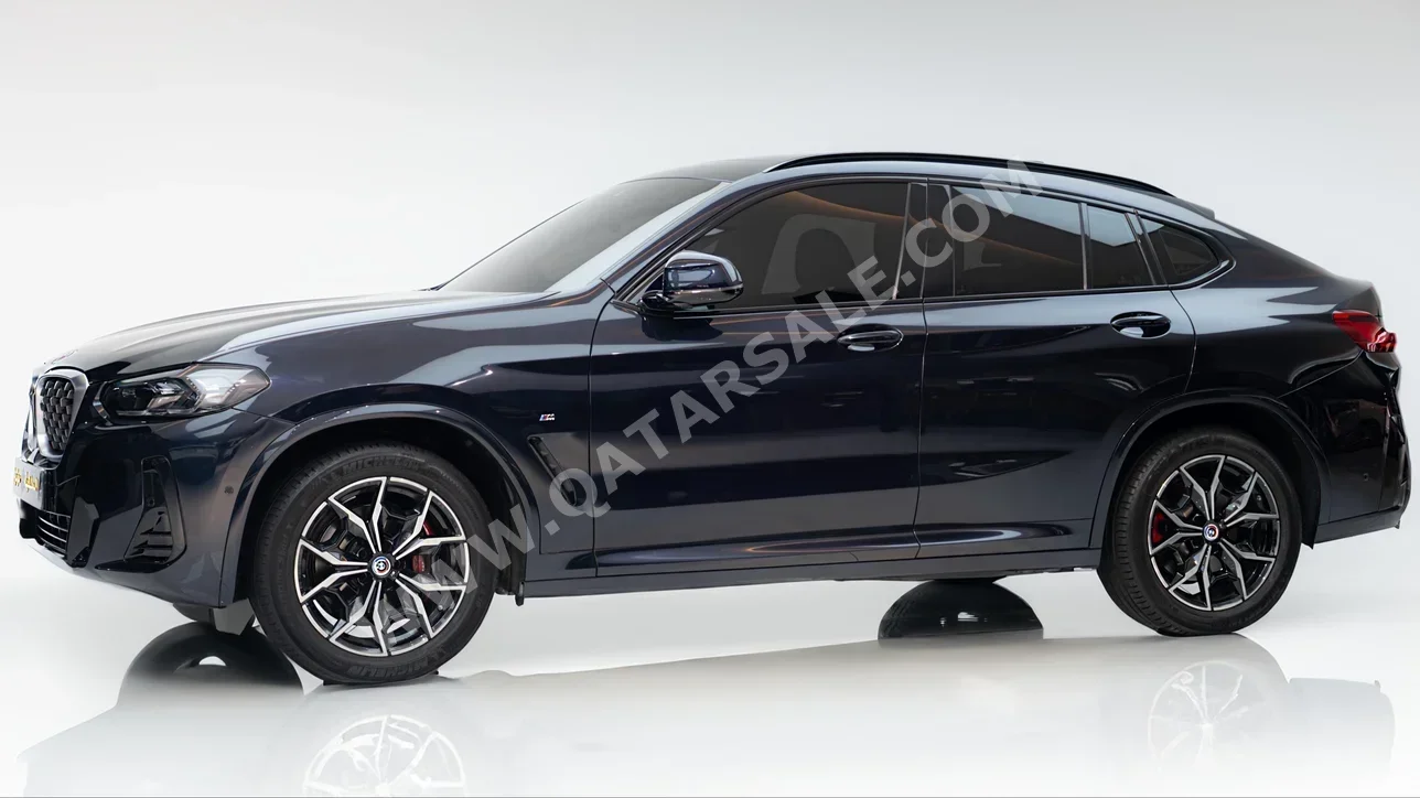 BMW  X-Series  X4  2023  Automatic  21٬000 Km  4 Cylinder  Four Wheel Drive (4WD)  SUV  Blue matte  With Warranty