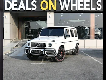 Mercedes-Benz  G-Class  63 AMG  2021  Automatic  24,500 Km  8 Cylinder  Four Wheel Drive (4WD)  SUV  White  With Warranty