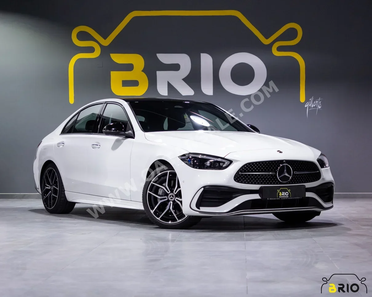 مرسيدس - بنز  سي - كلاس  300 AMG  2022  اوتوماتيك  15,000 كم  4 سلندر  دفع خلفي  سيدان  أبيض  تحت الضمان