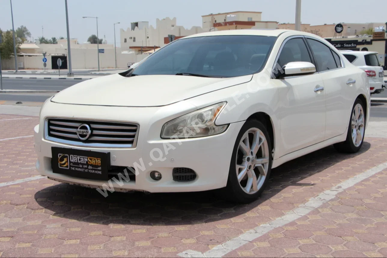 Nissan  Maxima  2012  Automatic  142,000 Km  6 Cylinder  Rear Wheel Drive (RWD)  Sedan  White