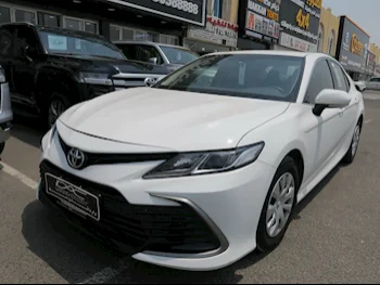 Toyota  Camry  LE  2022  Automatic  47,000 Km  4 Cylinder  Front Wheel Drive (FWD)  Sedan  White  With Warranty