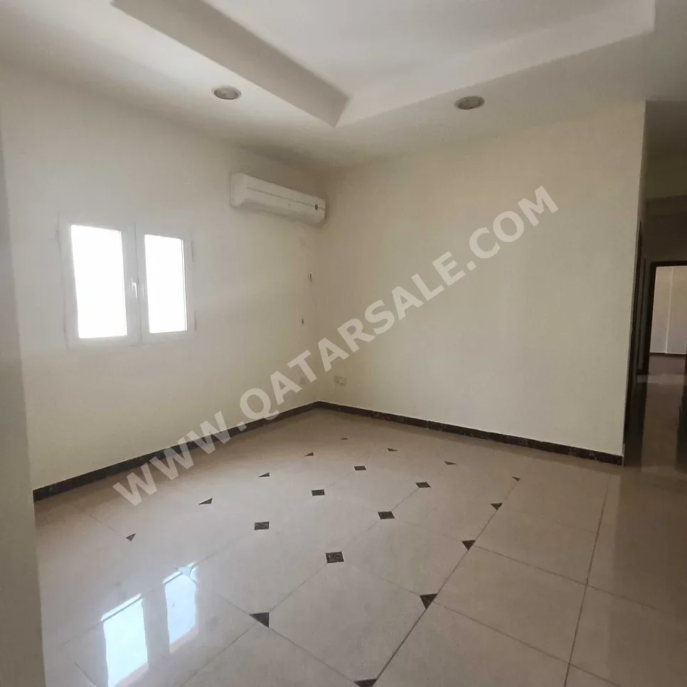 2 Bedrooms  Apartment  For Rent  in Doha -  Fereej Al Nasr  Not Furnished