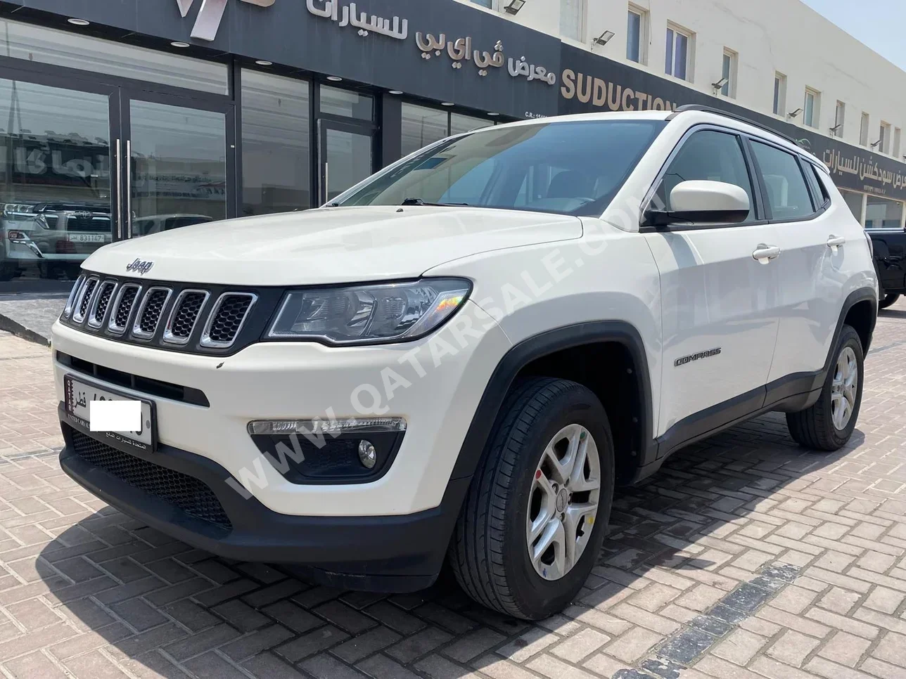 Jeep  Compass  longitude  2021  Automatic  65,000 Km  4 Cylinder  Four Wheel Drive (4WD)  SUV  White