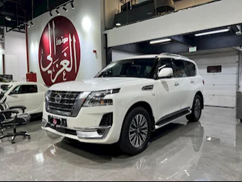 Nissan  Patrol  Titanium  2020  Automatic  116,000 Km  8 Cylinder  Four Wheel Drive (4WD)  SUV  White