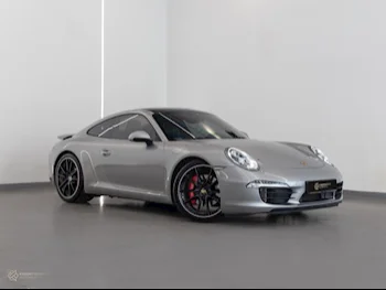 Porsche  911  Carrera S  2015  Automatic  82,500 Km  6 Cylinder  All Wheel Drive (AWD)  Coupe / Sport  Silver  With Warranty