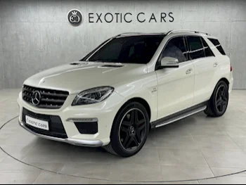 Mercedes-Benz  ML  63 AMG  2014  Automatic  135,000 Km  8 Cylinder  Four Wheel Drive (4WD)  SUV  White  With Warranty