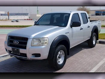 Ford  Ranger  2009  Manual  140,000 Km  4 Cylinder  Four Wheel Drive (4WD)  Pick Up  Gray