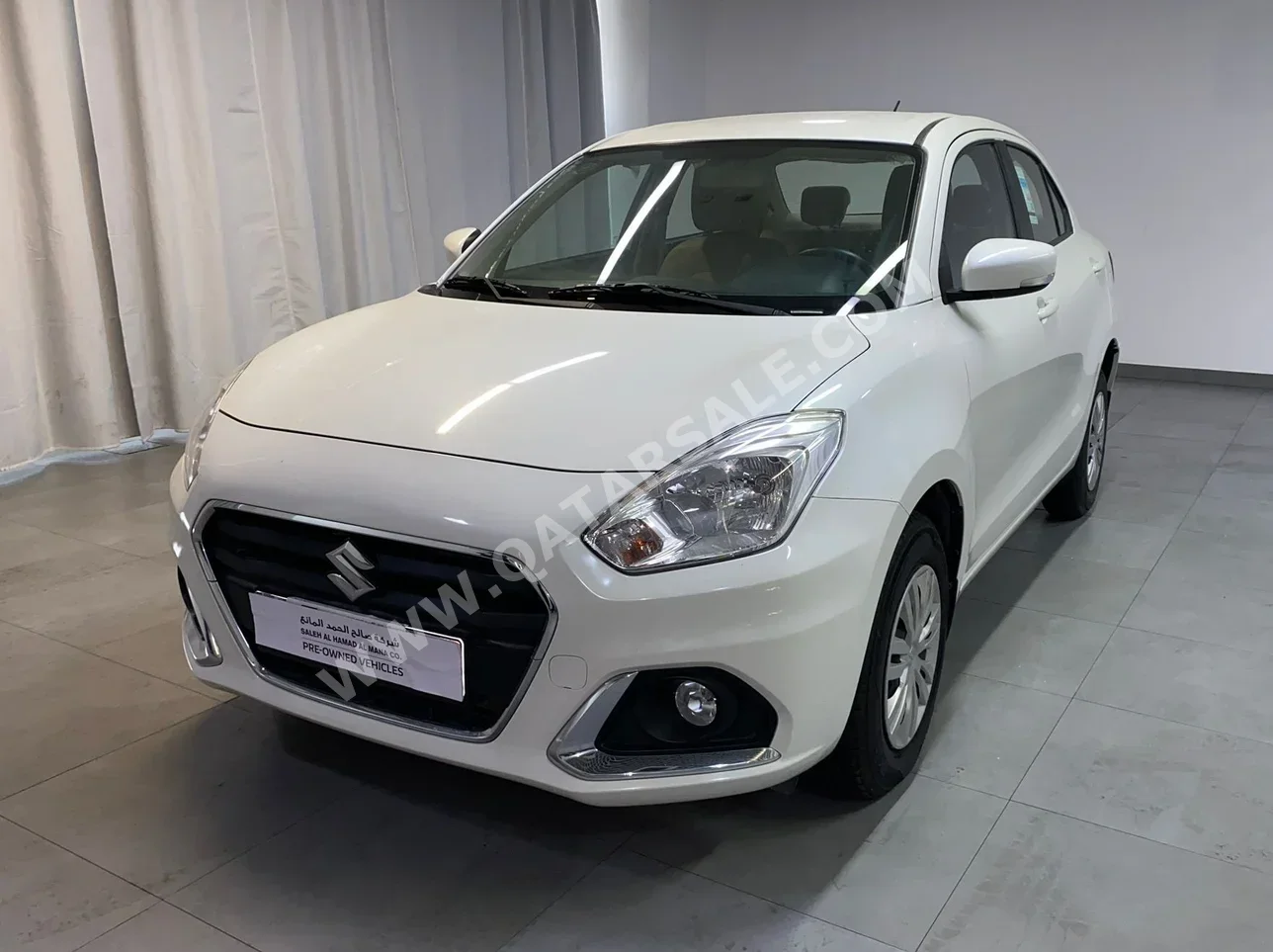 Suzuki  Dzire  2022  Automatic  69,700 Km  4 Cylinder  Front Wheel Drive (FWD)  Sedan  White