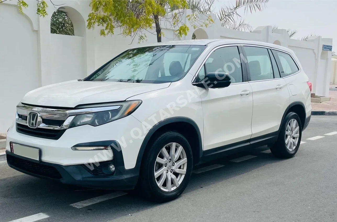 Honda  Pilot  2019  Automatic  85,000 Km  6 Cylinder  Front Wheel Drive (FWD)  SUV  White