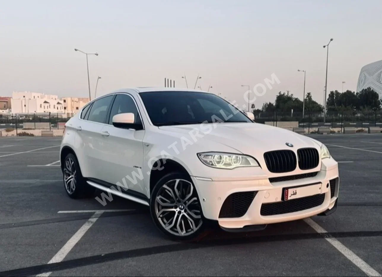 BMW  X-Series  X6  2013  Automatic  143,000 Km  8 Cylinder  Four Wheel Drive (4WD)  SUV  White  With Warranty