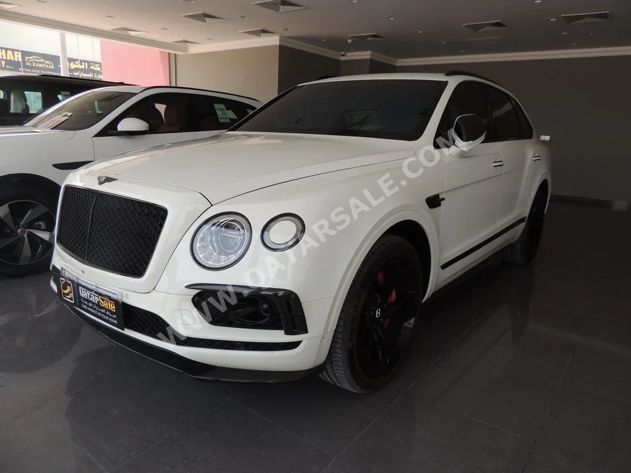 Bentley  Bentayga  2018  Automatic  31,000 Km  12 Cylinder  Four Wheel Drive (4WD)  SUV  White