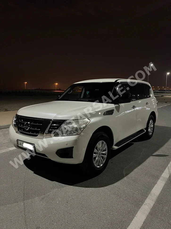 Nissan  Patrol  XE  2017  Automatic  166,000 Km  6 Cylinder  Four Wheel Drive (4WD)  SUV  White