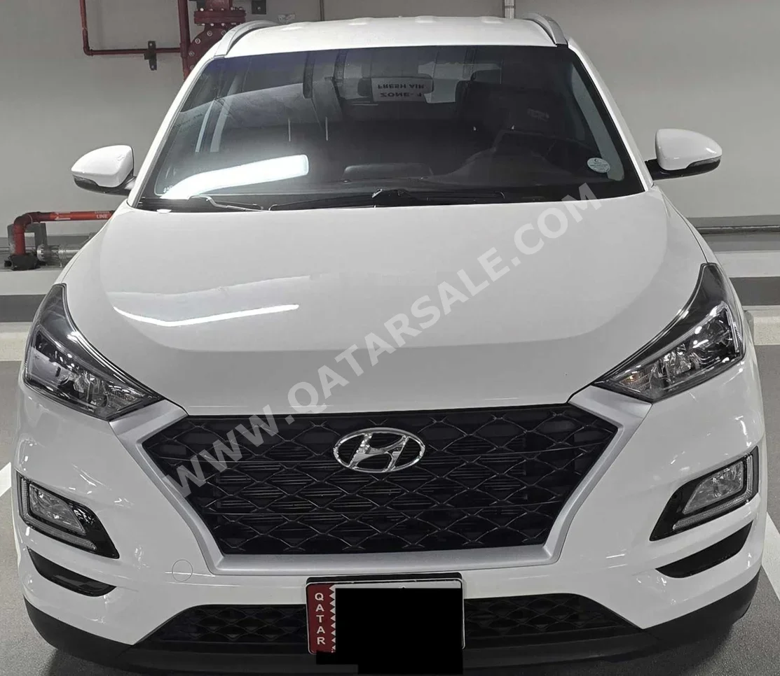 Hyundai  Tucson  Limited  2020  Automatic  58,000 Km  4 Cylinder  Front Wheel Drive (FWD)  SUV  White