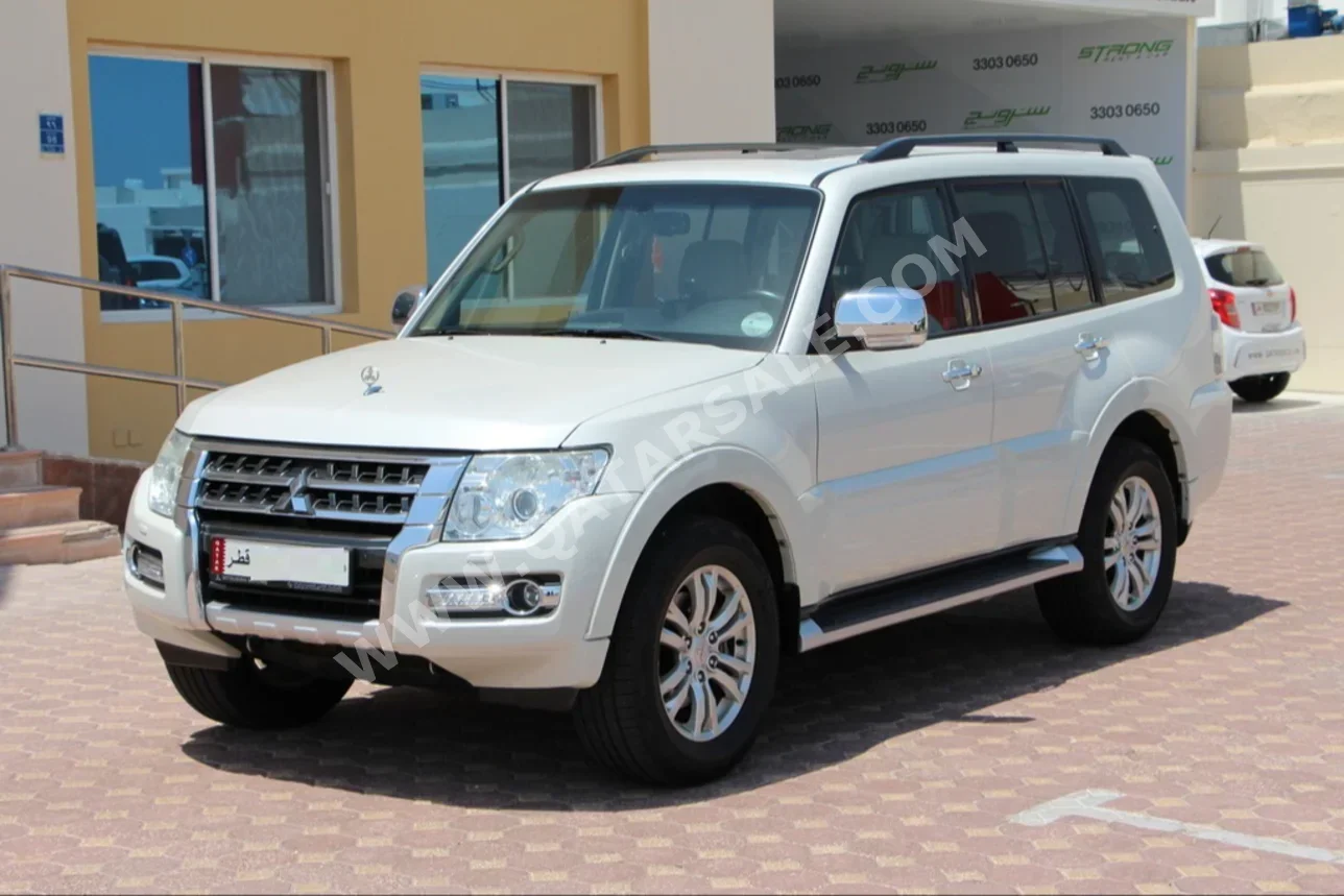 Mitsubishi  Pajero  3.8  2015  Automatic  116,000 Km  6 Cylinder  Four Wheel Drive (4WD)  SUV  White