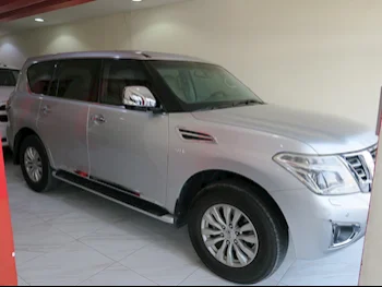 Nissan  Patrol  SE  2015  Automatic  200٬000 Km  8 Cylinder  Four Wheel Drive (4WD)  SUV  Silver