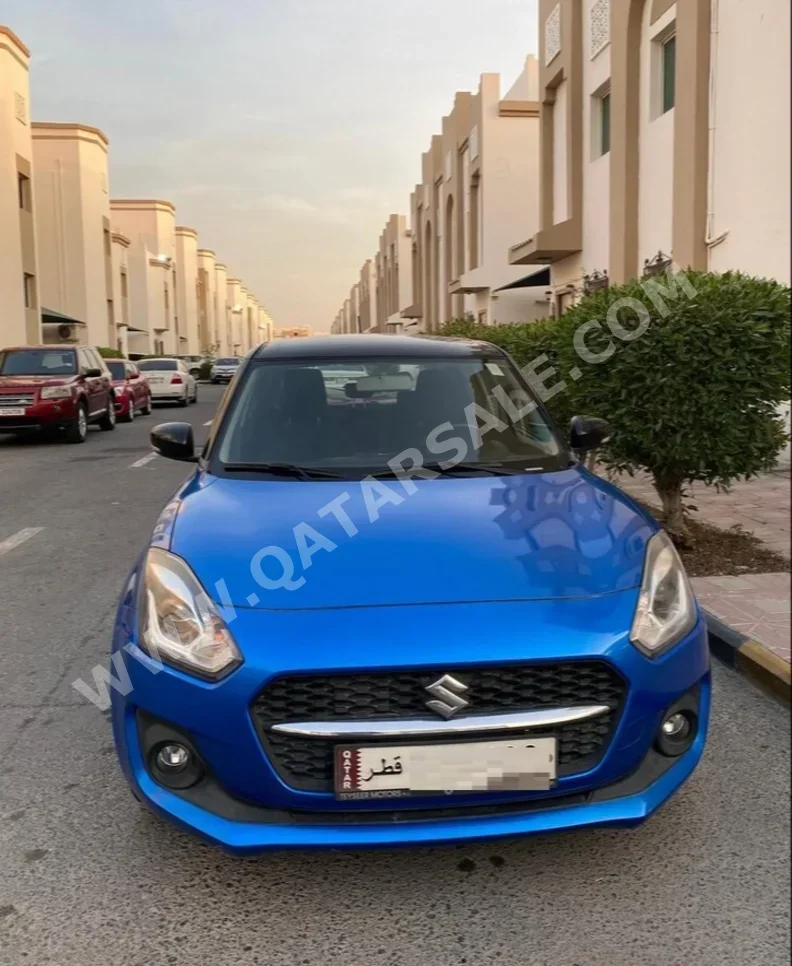 Suzuki  Swift  2021  Automatic  67,500 Km  4 Cylinder  Front Wheel Drive (FWD)  Hatchback  Blue  With Warranty