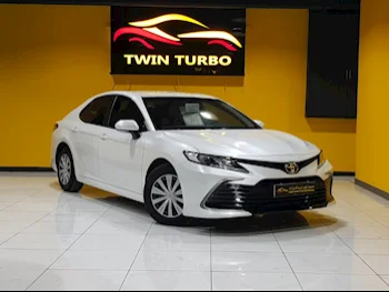 Toyota  Camry  LE  2023  Automatic  3,400 Km  4 Cylinder  Front Wheel Drive (FWD)  Sedan  White  With Warranty