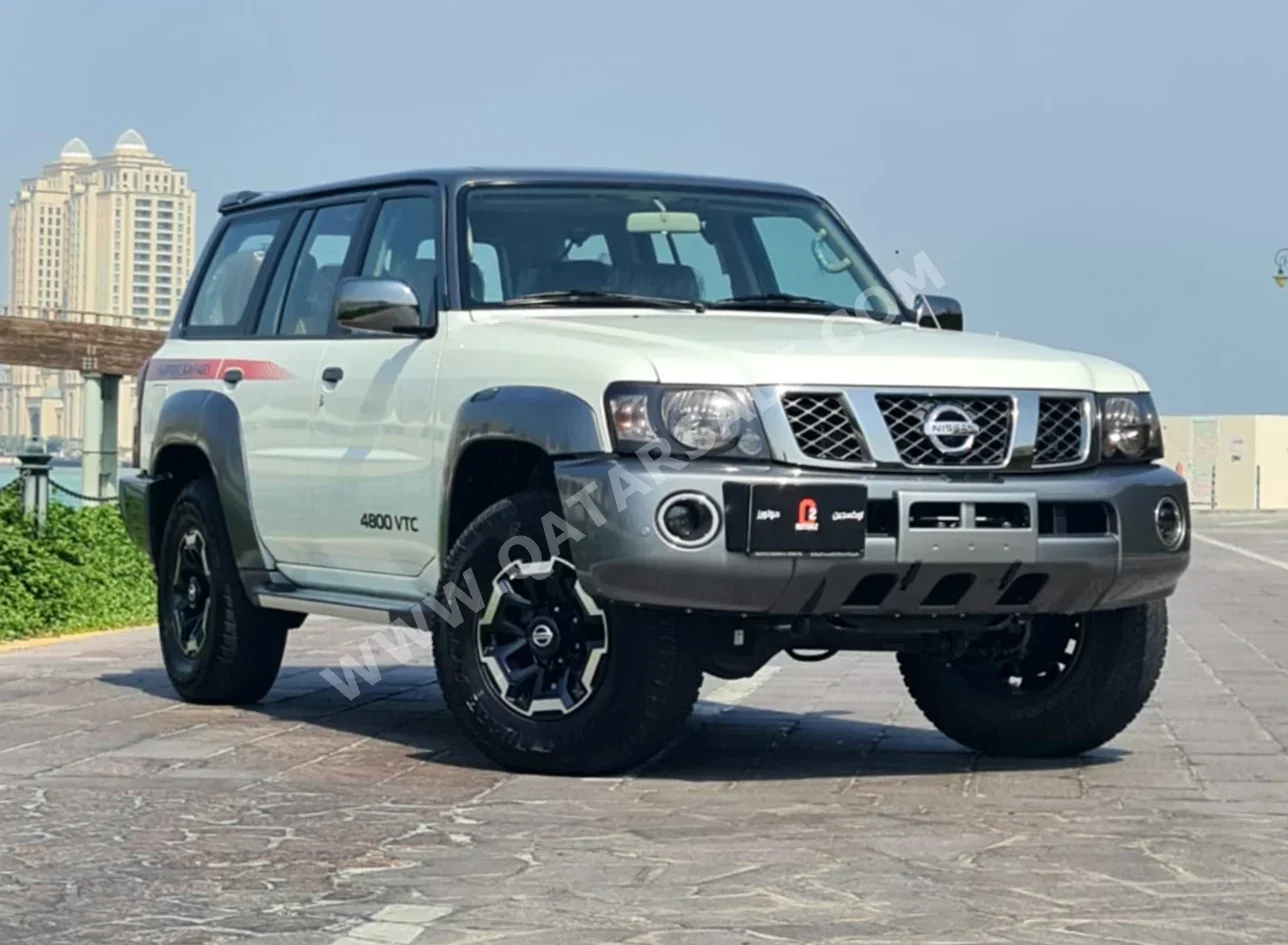 Nissan  Patrol  Super Safari  2021  Automatic  59,000 Km  6 Cylinder  Four Wheel Drive (4WD)  SUV  White