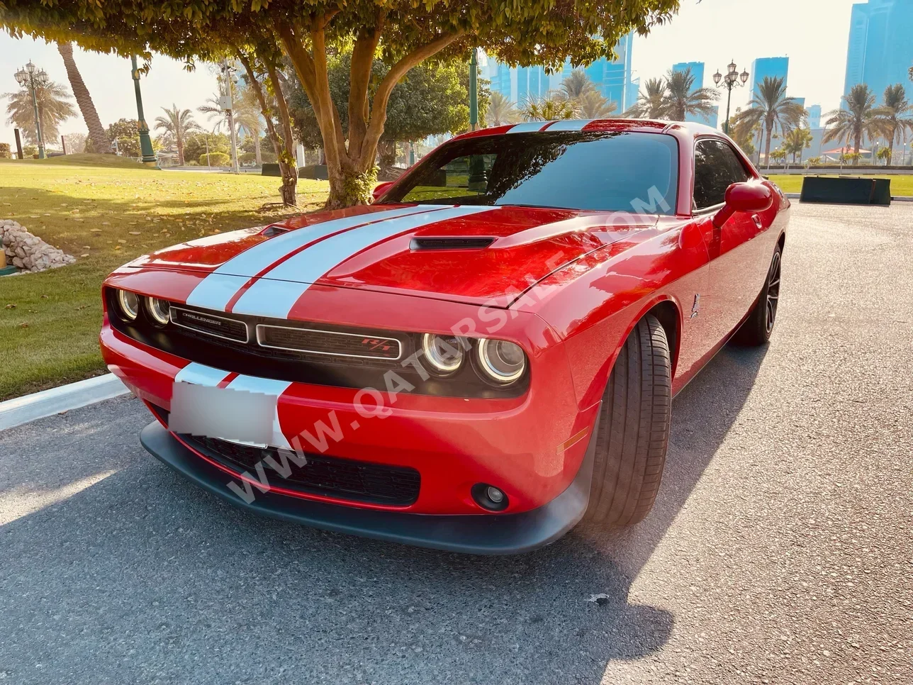 Dodge  Challenger  R/T Scat Pack  2016  Automatic  67,500 Km  8 Cylinder  Rear Wheel Drive (RWD)  Coupe / Sport  Red