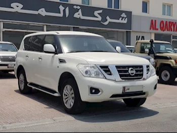 Nissan  Patrol  SE  2014  Automatic  285,000 Km  8 Cylinder  Four Wheel Drive (4WD)  SUV  White