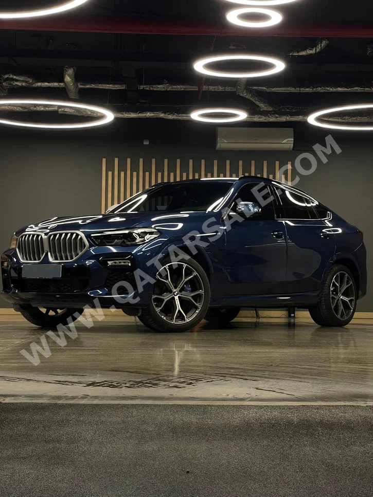 BMW  X-Series  X6 M40i  2022  Automatic  19٬000 Km  6 Cylinder  Four Wheel Drive (4WD)  SUV  Blue  With Warranty