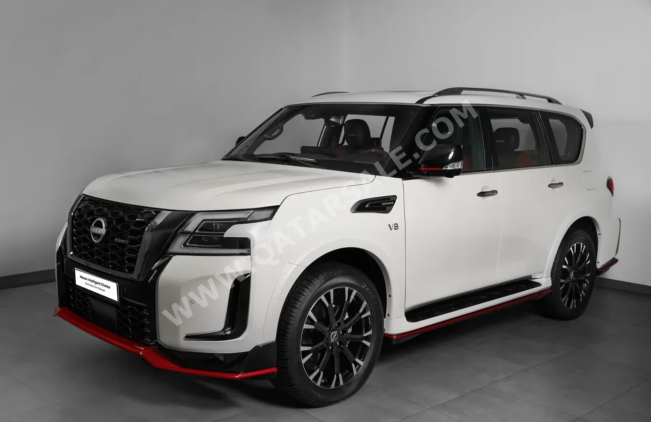 Nissan  Patrol  Nismo  2023  Automatic  13 Km  8 Cylinder  Four Wheel Drive (4WD)  SUV  White  With Warranty