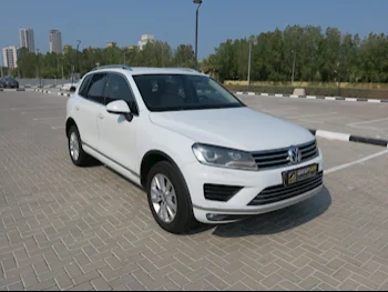 Volkswagen  Touareg  2015  Automatic  213,000 Km  6 Cylinder  All Wheel Drive (AWD)  SUV  White