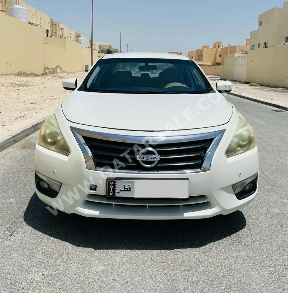 Nissan  Altima  2.5 SV  2014  Automatic  172,000 Km  4 Cylinder  Sedan  White