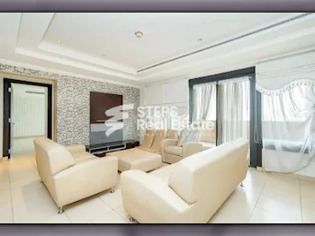 2 Bedrooms  Apartment  For Sale  in Doha -  The Pearl  Semi Furnished