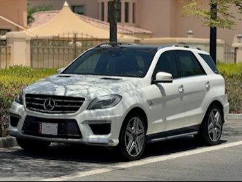 Mercedes-Benz  ML  63 AMG  2014  Automatic  136,000 Km  8 Cylinder  Four Wheel Drive (4WD)  SUV  White