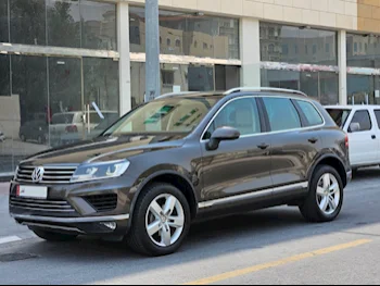 Volkswagen  Touareg  2016  Automatic  125,000 Km  6 Cylinder  All Wheel Drive (AWD)  SUV  Brown