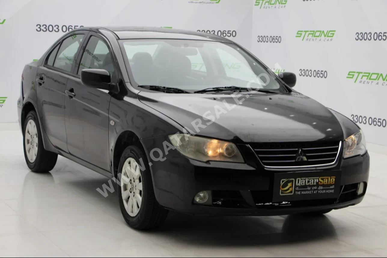 Mitsubishi  Lancer  2014  Automatic  171,000 Km  4 Cylinder  Front Wheel Drive (FWD)  Sedan  Black