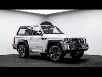 Nissan  Patrol  Super Safari  2024  Automatic  0 Km  6 Cylinder  Four Wheel Drive (4WD)  SUV  White  With Warranty