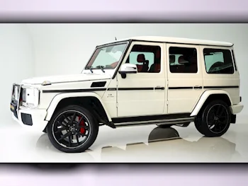 Mercedes-Benz  G-Class  63 AMG  2014  Automatic  44٬000 Km  8 Cylinder  Four Wheel Drive (4WD)  SUV  White