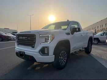 GMC  Sierra  AT4  2022  Automatic  100,000 Km  8 Cylinder  Four Wheel Drive (4WD)  Pick Up  White