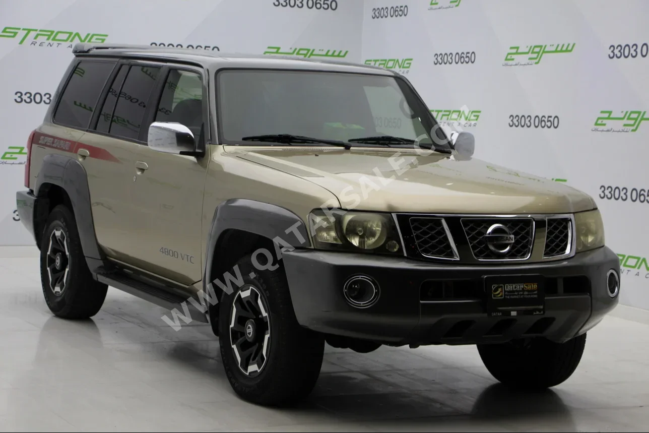 Nissan  Patrol  Safari  2005  Automatic  295,000 Km  6 Cylinder  Four Wheel Drive (4WD)  SUV  Gold