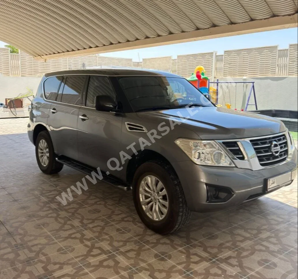 Nissan  Patrol  XE  2019  Automatic  140,000 Km  6 Cylinder  Four Wheel Drive (4WD)  SUV  Gray