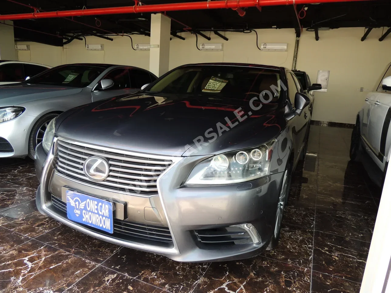 Lexus  LS  600 HL  2013  Automatic  194,000 Km  8 Cylinder  Rear Wheel Drive (RWD)  Sedan  Gray