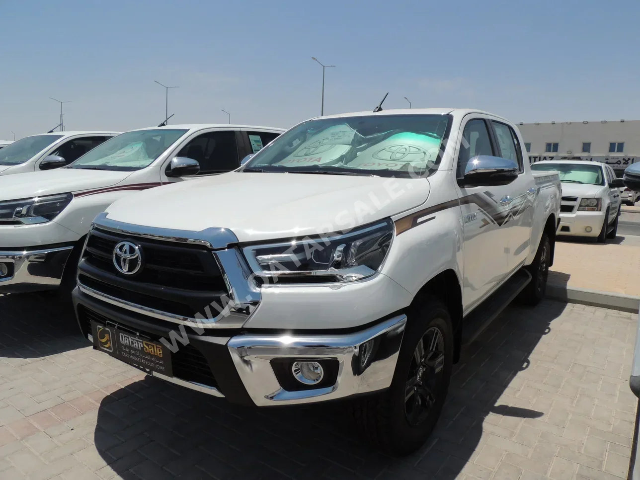 Toyota  Hilux  SR5  2024  Automatic  0 Km  4 Cylinder  Four Wheel Drive (4WD)  Pick Up  White  With Warranty