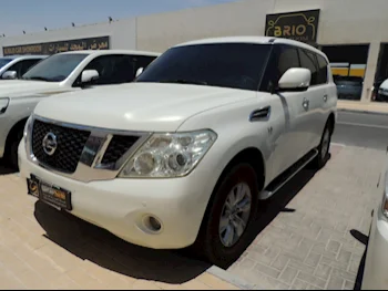 Nissan  Patrol  SE  2013  Automatic  196,000 Km  8 Cylinder  Four Wheel Drive (4WD)  SUV  White