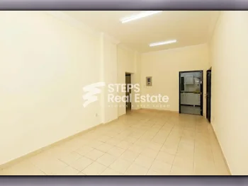 2 Bedrooms  Apartment  For Rent  in Doha -  Najma  Not Furnished