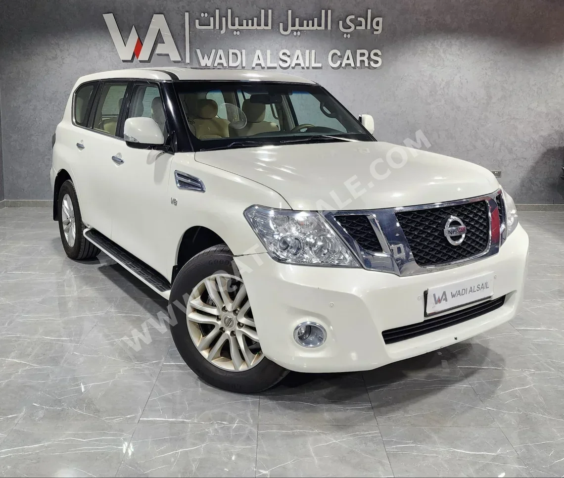 Nissan  Patrol  LE  2012  Automatic  87,000 Km  8 Cylinder  Four Wheel Drive (4WD)  SUV  White