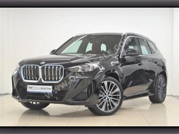 BMW  IX  1  2024  Automatic  3,575 Km  0 Cylinder  Rear Wheel Drive (RWD)  Sedan  Black  With Warranty