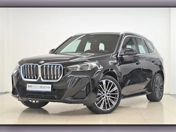 BMW  IX  1  2024  Automatic  3,575 Km  0 Cylinder  Rear Wheel Drive (RWD)  Sedan  Black  With Warranty